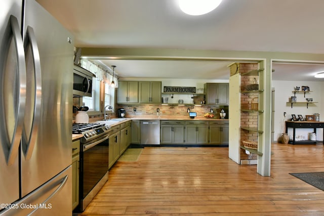 157 Mosquito Swamp Rd, Greenwich, NY 12834 - kitchen with appliances with stainless steel finishes, green cabinetry, open shelves, light wood-style flooring, and light countertops
