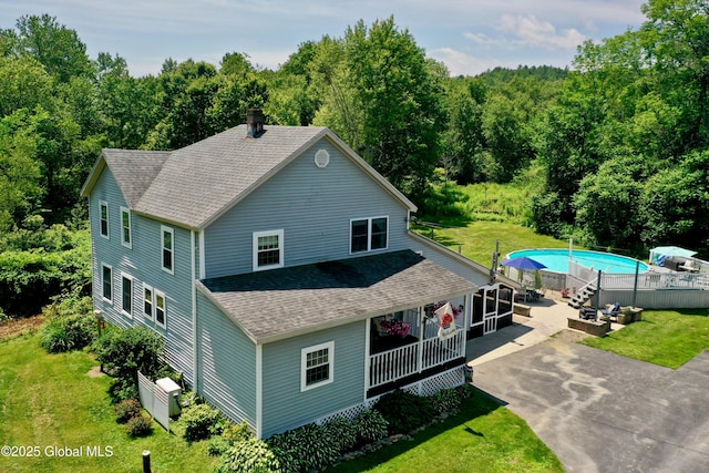 157 Mosquito Swamp Rd, Greenwich, NY 12834 - view of home's exterior with a shingled roof, an outdoor pool, and a yard