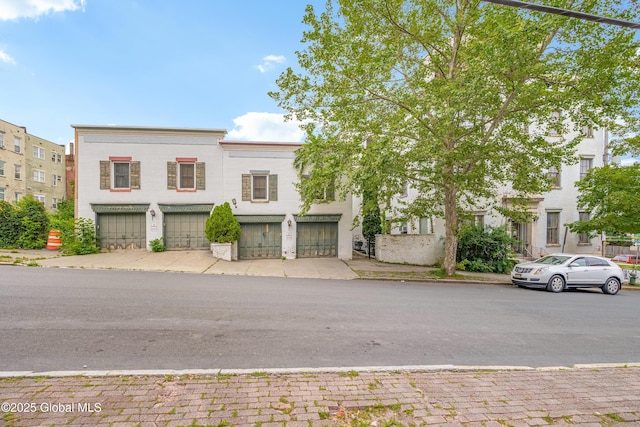 2 Ash Grove Pl Unit 4, Albany, NY 12202 - townhome / multi-family property with an attached garage