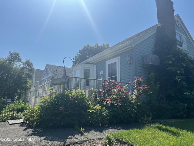 56 Wendell St, Ravena, NY 12143 - view of side of property with a chimney