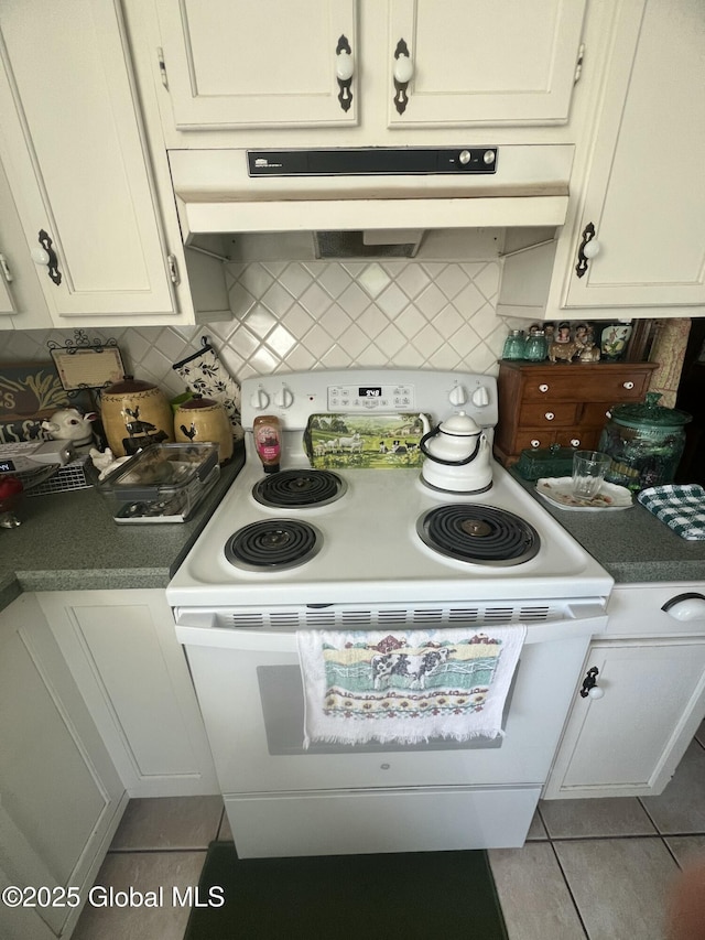 56 Wendell St, Ravena, NY 12143 - kitchen featuring electric range, tile patterned flooring, ventilation hood, backsplash, and white cabinetry