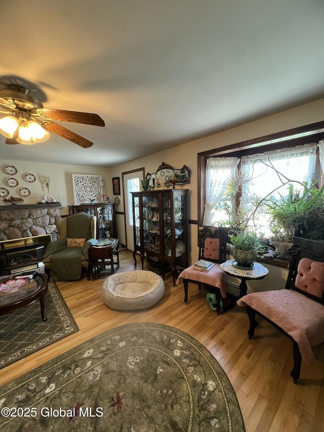 56 Wendell St, Ravena, NY 12143 - living area with wood finished floors and ceiling fan