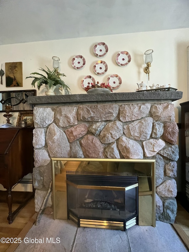 56 Wendell St, Ravena, NY 12143 - detailed view of a glass covered fireplace