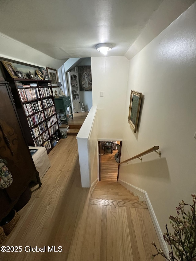 56 Wendell St, Ravena, NY 12143 - stairs featuring vaulted ceiling and wood finished floors