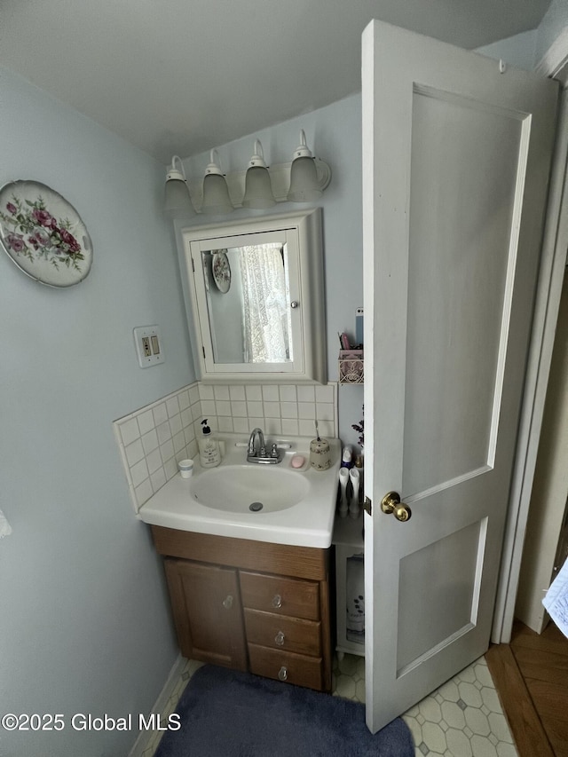 56 Wendell St, Ravena, NY 12143 - bathroom featuring vanity and backsplash