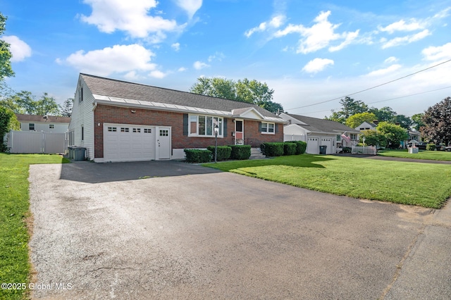 954 Obrien Ave, Rotterdam, NY 12303 - ranch-style house featuring an attached garage, brick siding, driveway, and roof with shingles
