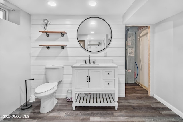 954 Obrien Ave, Rotterdam, NY 12303 - bathroom with vanity, wood finished floors, and wood walls