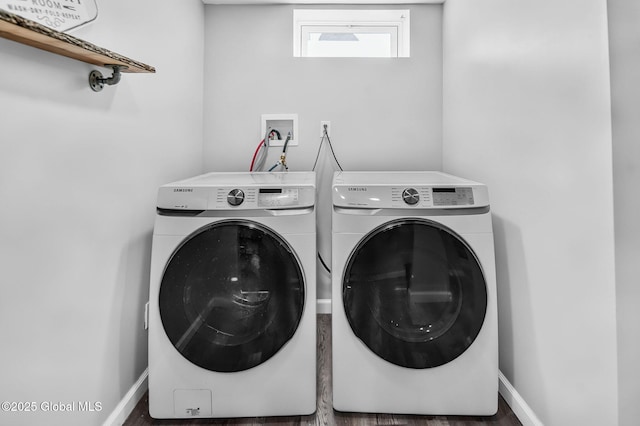 954 Obrien Ave, Rotterdam, NY 12303 - laundry area featuring washing machine and clothes dryer and wood finished floors