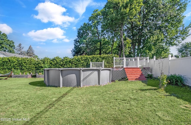 954 Obrien Ave, Rotterdam, NY 12303 - fenced backyard with a deck