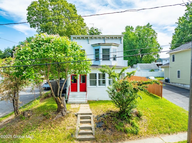 1818 4th St, Rensselaer, NY 12144 - italianate house featuring a balcony and entry steps