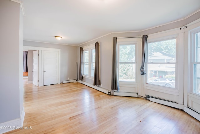 1818 4th St, Rensselaer, NY 12144 - unfurnished room with light wood-style flooring, ornamental molding, and a baseboard heating unit