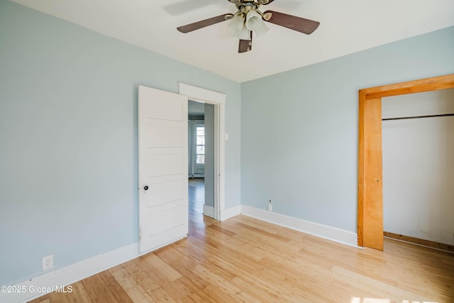 1818 4th St, Rensselaer, NY 12144 - unfurnished bedroom featuring light wood-style flooring, a ceiling fan, and a closet