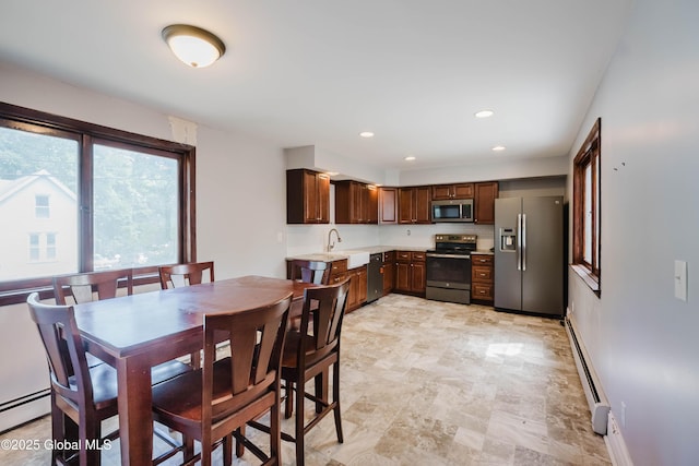 1818 4th St, Rensselaer, NY 12144 - dining space featuring recessed lighting and baseboard heating