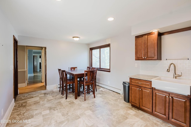 1818 4th St, Rensselaer, NY 12144 - dining room with baseboard heating and baseboards