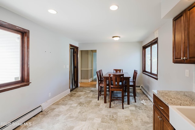 1818 4th St, Rensselaer, NY 12144 - dining area with baseboard heating and recessed lighting