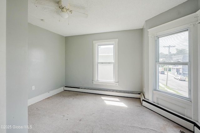 1818 4th St, Rensselaer, NY 12144 - carpeted empty room with a baseboard radiator, baseboard heating, and a ceiling fan