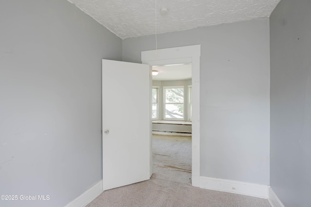 1818 4th St, Rensselaer, NY 12144 - unfurnished room featuring carpet floors and a textured ceiling