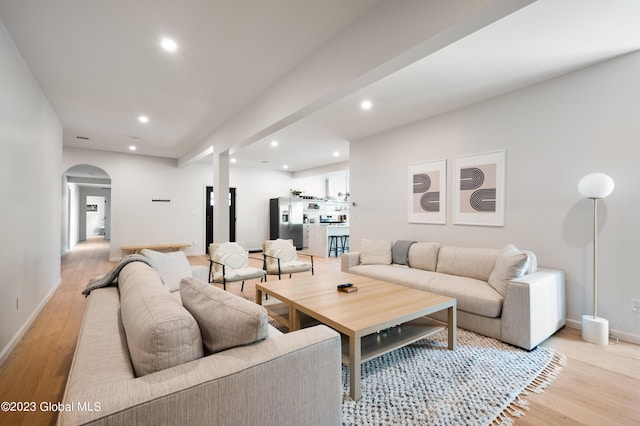1 Wawayanda Pl, Middletown, NY 10940 - living area with arched walkways, light wood-style flooring, and recessed lighting