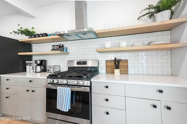 1 Wawayanda Pl, Middletown, NY 10940 - kitchen featuring open shelves, stainless steel range with gas stovetop, range hood, and tasteful backsplash