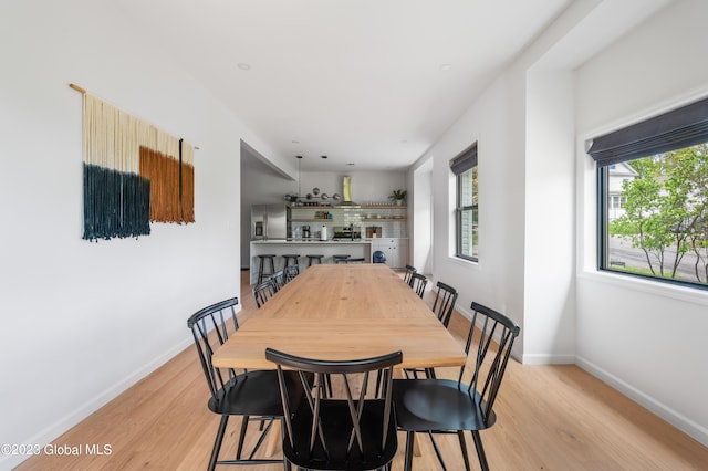 1 Wawayanda Pl, Middletown, NY 10940 - dining room with light wood-type flooring and baseboards