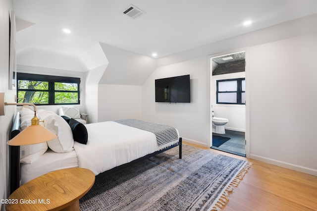 1 Wawayanda Pl, Middletown, NY 10940 - bedroom with wood finished floors, recessed lighting, lofted ceiling, and ensuite bath