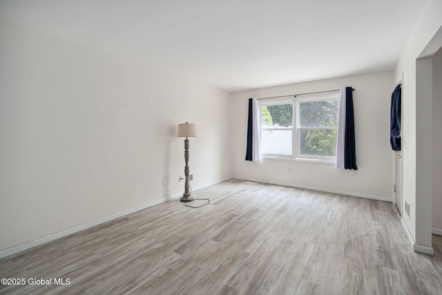 24 Esplande St, Bethlehem, NY 12158 - spare room with light wood-style flooring and baseboards