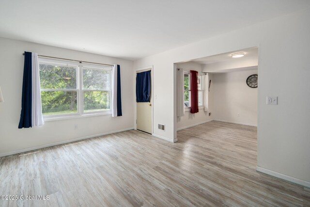 24 Esplande St, Bethlehem, NY 12158 - empty room with light wood-type flooring and baseboards