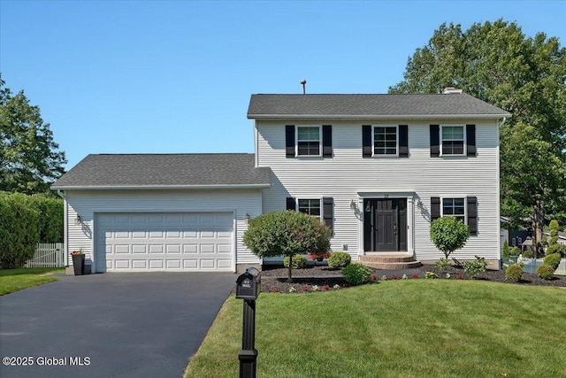 139 Country Walk Rd, Rotterdam, NY 12306 - colonial inspired home with asphalt driveway and a garage