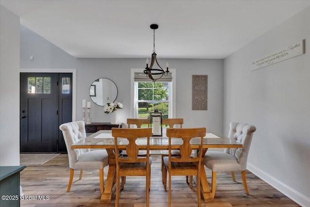 139 Country Walk Rd, Rotterdam, NY 12306 - dining room featuring a chandelier and light wood finished floors