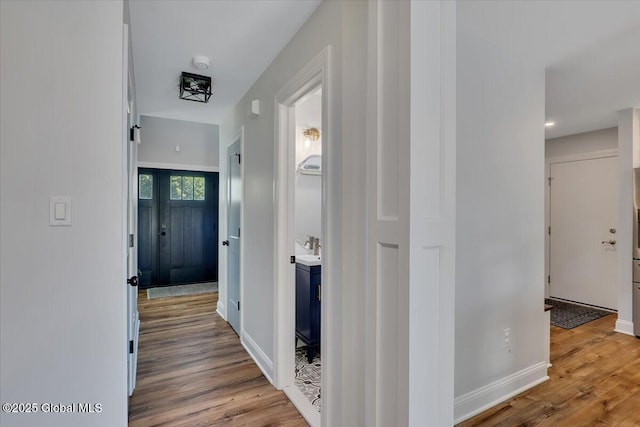 139 Country Walk Rd, Rotterdam, NY 12306 - hallway featuring wood finished floors and baseboards