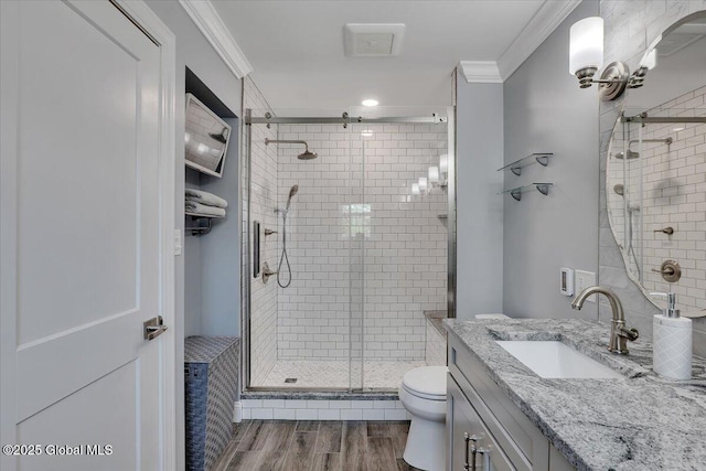 139 Country Walk Rd, Rotterdam, NY 12306 - bathroom featuring ornamental molding, vanity, wood finished floors, and a shower stall