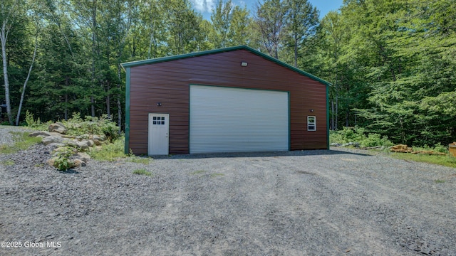 102 Taylor Ct, Mayfield, NY 12117 - detached garage with a wooded view
