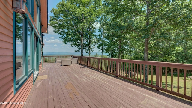 102 Taylor Ct, Mayfield, NY 12117 - wooden deck with an outdoor hangout area