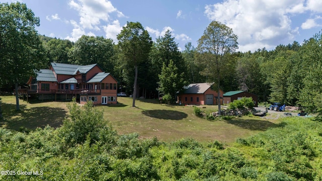 102 Taylor Ct, Mayfield, NY 12117 - view of green lawn with a wooded view and a deck