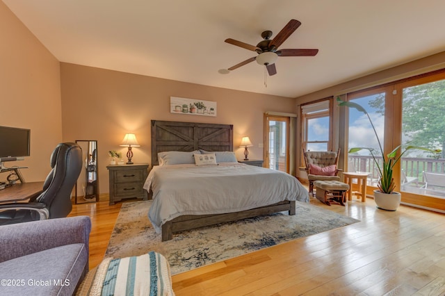 102 Taylor Ct, Mayfield, NY 12117 - bedroom featuring access to outside, light wood-style floors, and a ceiling fan