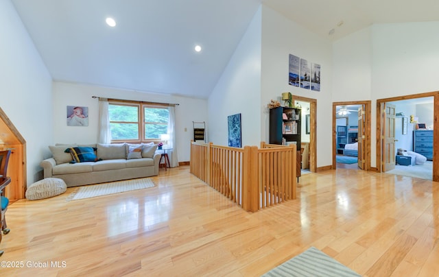 102 Taylor Ct, Mayfield, NY 12117 - living area featuring high vaulted ceiling and wood finished floors