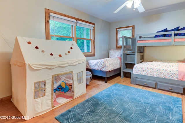102 Taylor Ct, Mayfield, NY 12117 - bedroom with wood finished floors and a ceiling fan