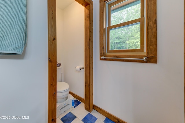 102 Taylor Ct, Mayfield, NY 12117 - bathroom featuring toilet and baseboards