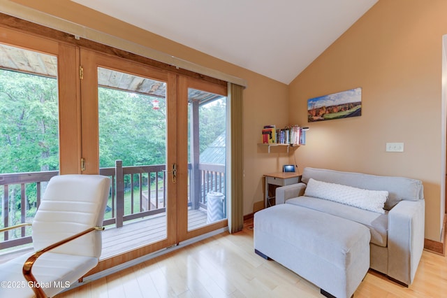 102 Taylor Ct, Mayfield, NY 12117 - sitting room with light wood finished floors and vaulted ceiling