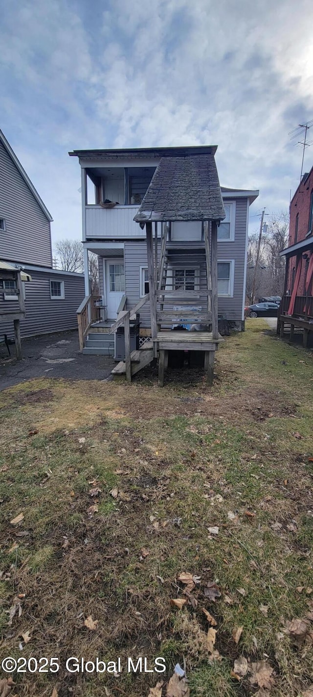 1 Alden St, Colonie, NY 12189 - rear view of property with a yard, a balcony, and a shingled roof