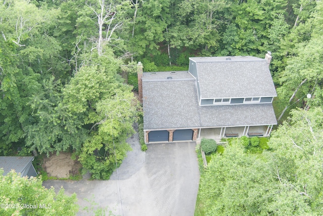654 Birchwood Dr, Princetown, NY 12056 - aerial view of property's location with a heavily wooded area