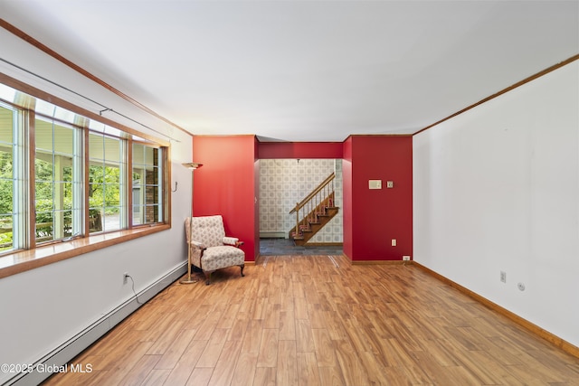 654 Birchwood Dr, Princetown, NY 12056 - unfurnished room with baseboard heating, wood finished floors, and stairs