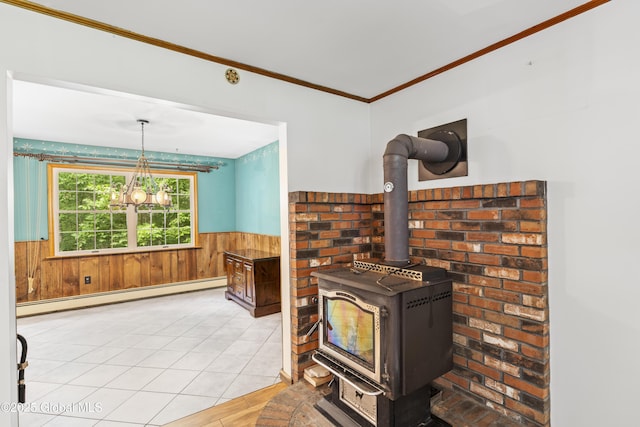 654 Birchwood Dr, Princetown, NY 12056 - living area with a baseboard radiator, wainscoting, wooden walls, a wood stove, and ornamental molding
