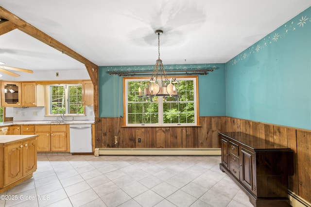 654 Birchwood Dr, Princetown, NY 12056 - unfurnished dining area featuring baseboard heating, a wainscoted wall, wood walls, and ceiling fan