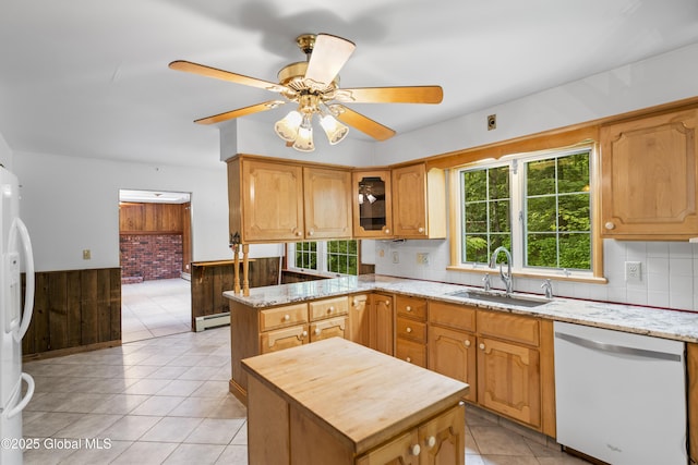 654 Birchwood Dr, Princetown, NY 12056 - kitchen featuring white appliances, a wainscoted wall, wood walls, baseboard heating, and ceiling fan