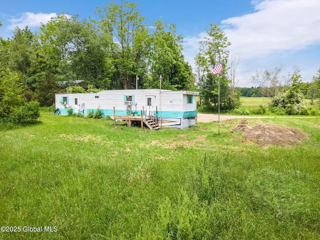 3852 State Route 85, Westerlo, NY 12193 - back of property with a deck, a lawn, and view of scattered trees