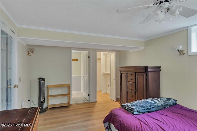273 Pinehurst Ave, East Greenbush, NY 12144 - bedroom featuring light wood-style floors, crown molding, a textured ceiling, and ceiling fan