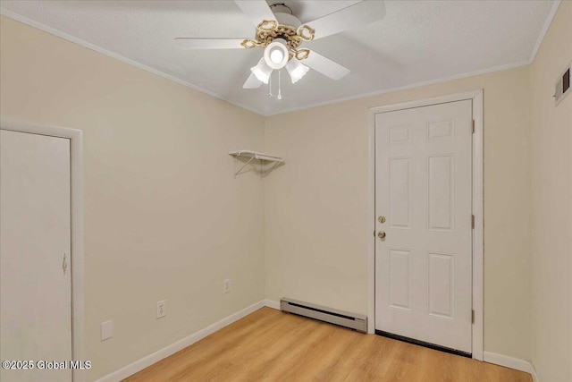 273 Pinehurst Ave, East Greenbush, NY 12144 - unfurnished room with a baseboard radiator, light wood-type flooring, a ceiling fan, crown molding, and a textured ceiling