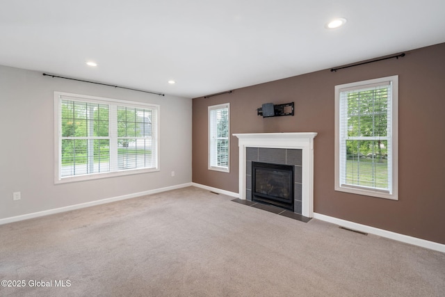 5 Heather Ln, Corinth, NY 12822 - unfurnished living room with recessed lighting, carpet floors, and a tiled fireplace