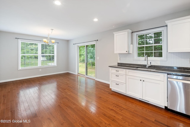 5 Heather Ln, Corinth, NY 12822 - kitchen with stainless steel dishwasher, a chandelier, white cabinets, hardwood / wood-style floors, and recessed lighting